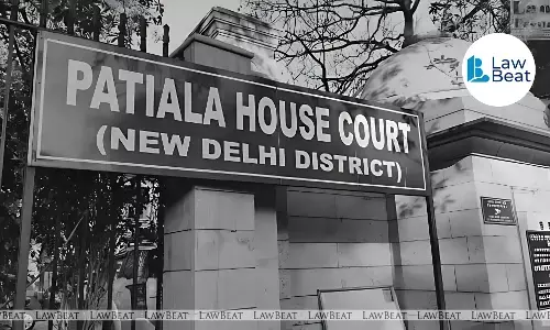 Businessman Sushil Ansal appearing via video conferencing as Patiala House Court framed charges in a passport fraud case.