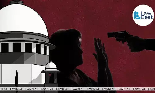 Supreme Court of India building in New Delhi where Bench directed accused to surrender for threatening woman Court Commissioner with a pistol.