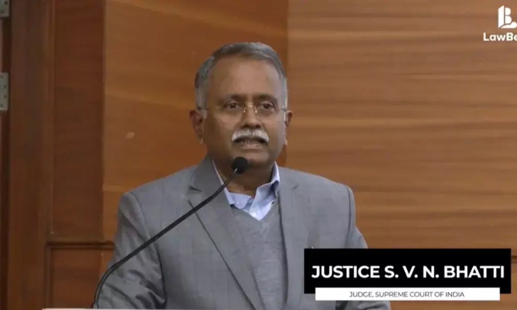 Justice S V N Bhatti delivering a speech on fundamental duties at the Adhivakta Parishad event in New Delhi.