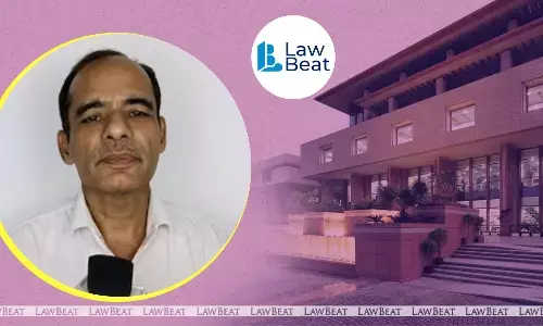 YouTuber Gulshan Pahuja with Delhi High Court building in the background following contempt conviction by the High Court. YouTuber Gulshan Pahuja with Delhi High Court building in the background following contempt conviction by the High Court.