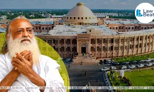 Asaram Bapu in front of the Rajasthan High Court building following a judgment partly allowing his appeal while retaining his life sentence for rape. Asaram Bapu in front of the Rajasthan High Court building following a judgment partly allowing his appeal while retaining his life sentence for rape.